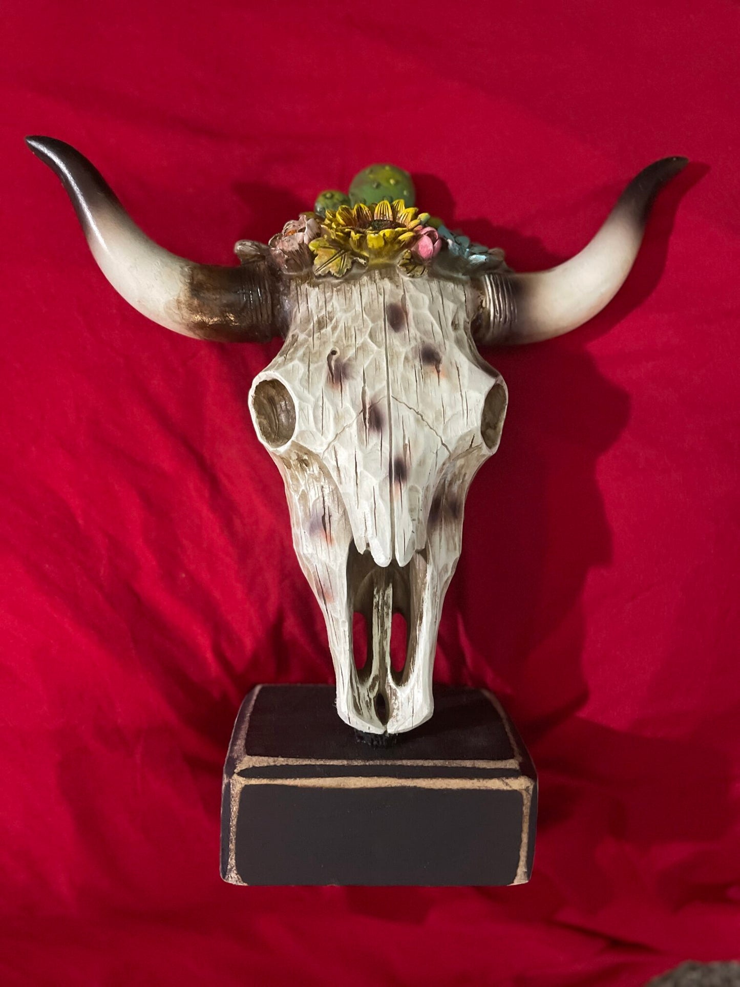 White Cowskull with stand and sunflowers